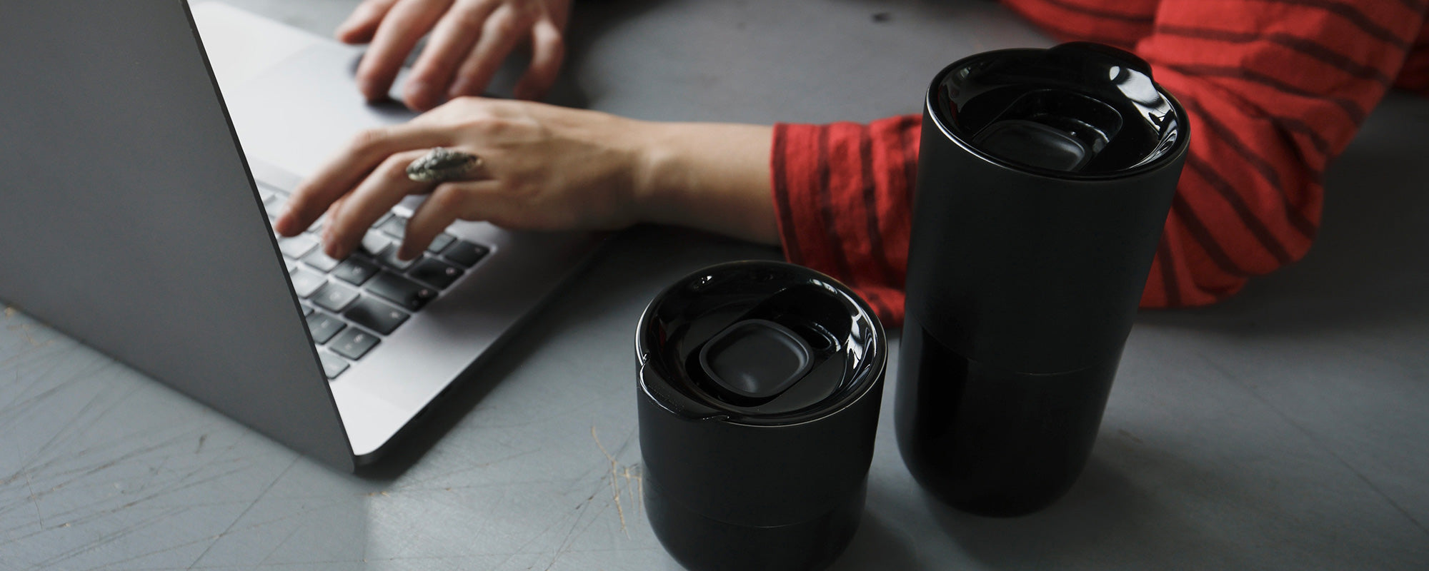 Klean Kanteen Rise tumblers at a work table